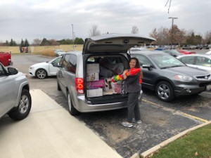 loading car with toys